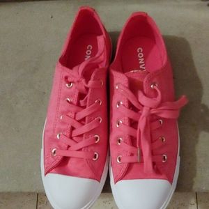 Pink converse tennis shoes